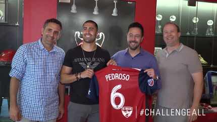 Marquinhos Pedroso signs with FC Dallas. Also pictured are Podroso's agent (left), FC Dallas...