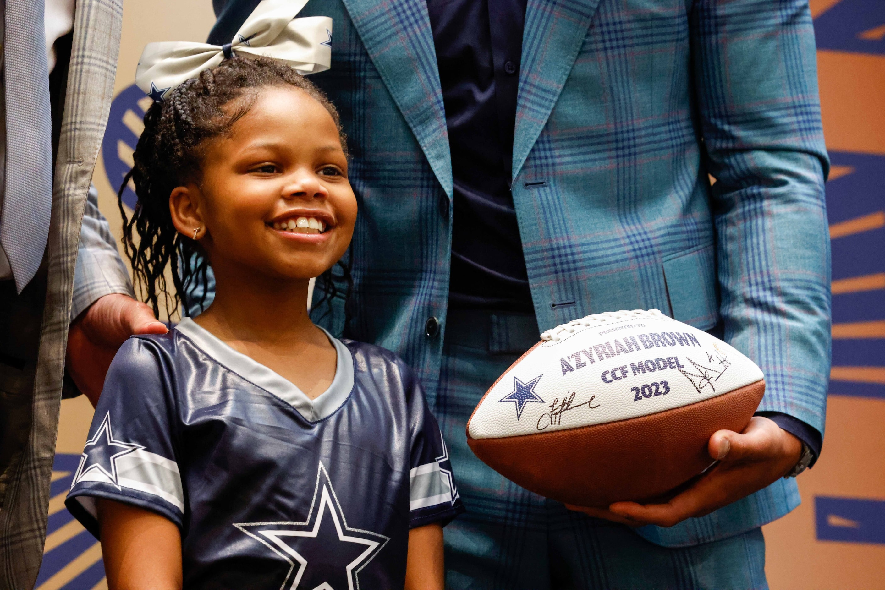 Dallas Cowboys Troy Aikman and Dak Prescott introduce A'zyriah Brown as a model for the...