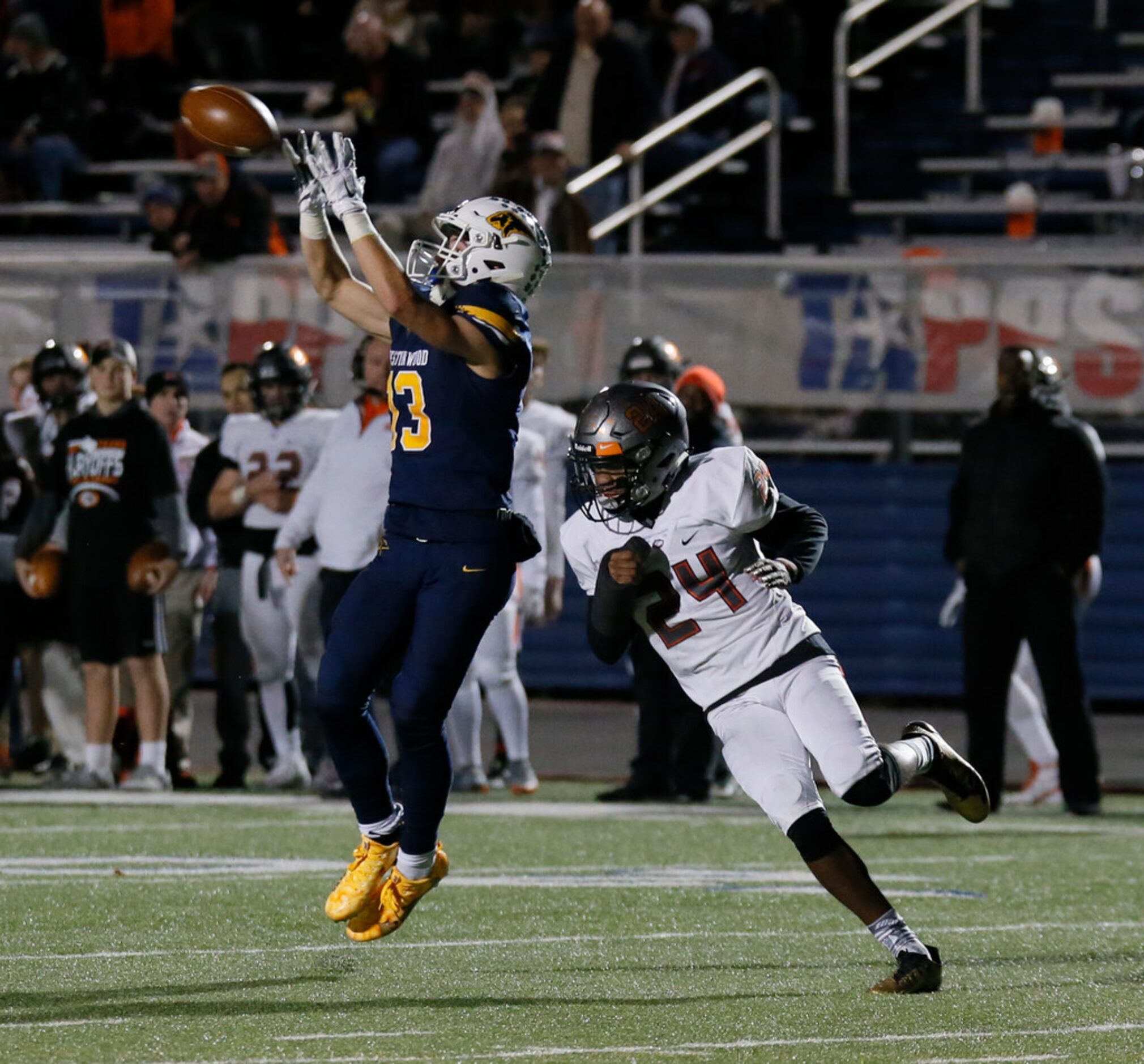 Prestonwood Christian Academy Luke Savege (13) catches a pass for a first down, tackled by...