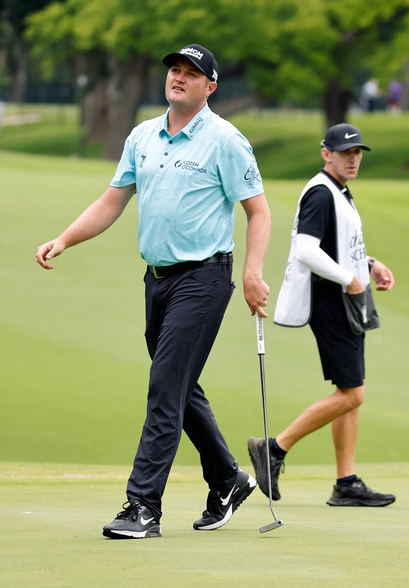 Professional golfer Jason Kokrak reacts after missing a birdie putt on No. 5 during round...