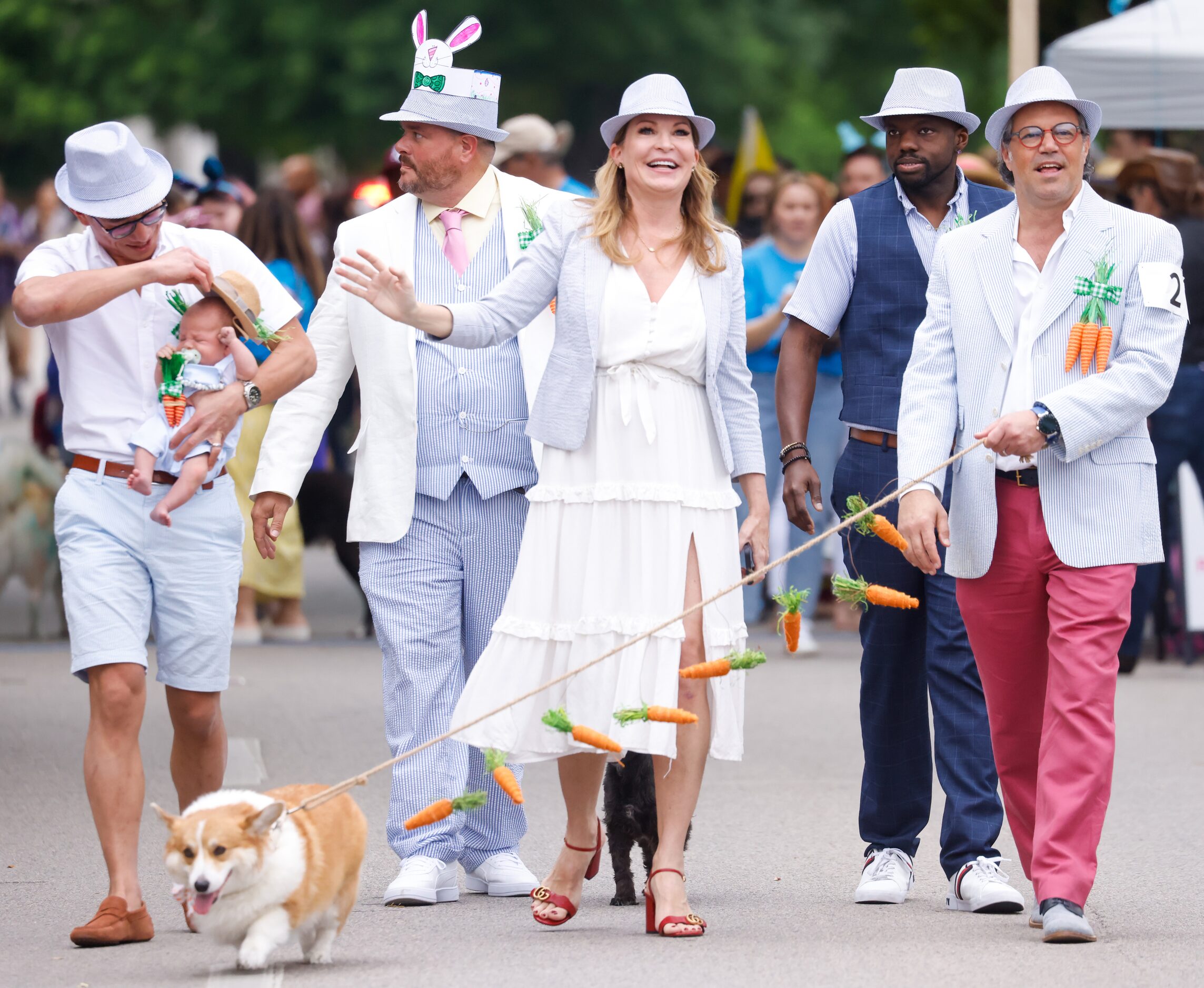 A group entry for the Pooch Parade make their way toward the judges on Turtle Creek...