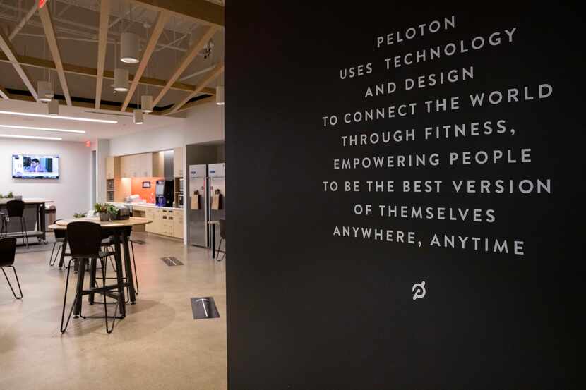 Peloton's mission statement is prominently displayed in an employee break room in Plano.