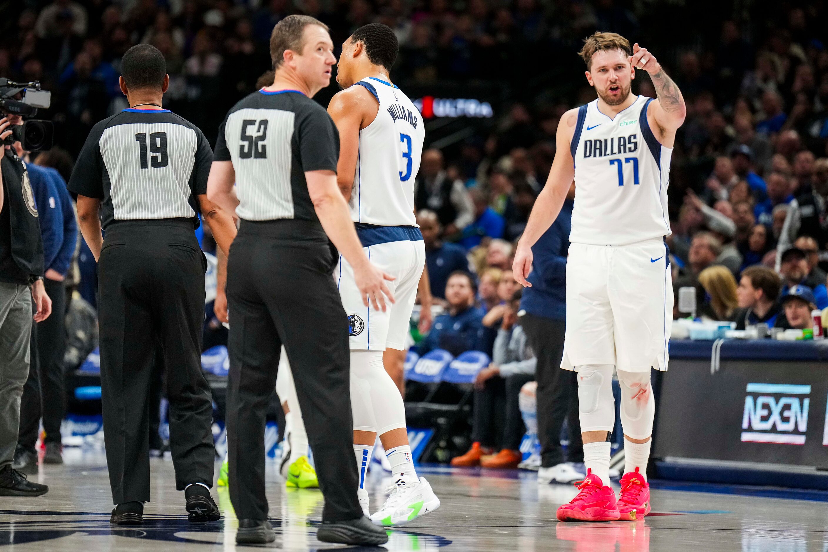 Dallas Mavericks guard Luka Doncic (77) argues for a call during the second half of an NBA...