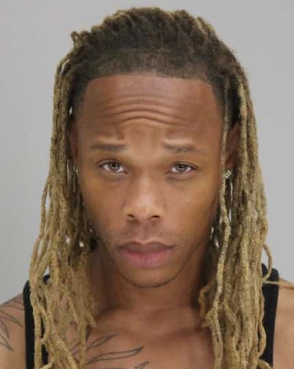 Johnnie Ray Palmore, now 33, pictured in a mugshot taken July 2018.