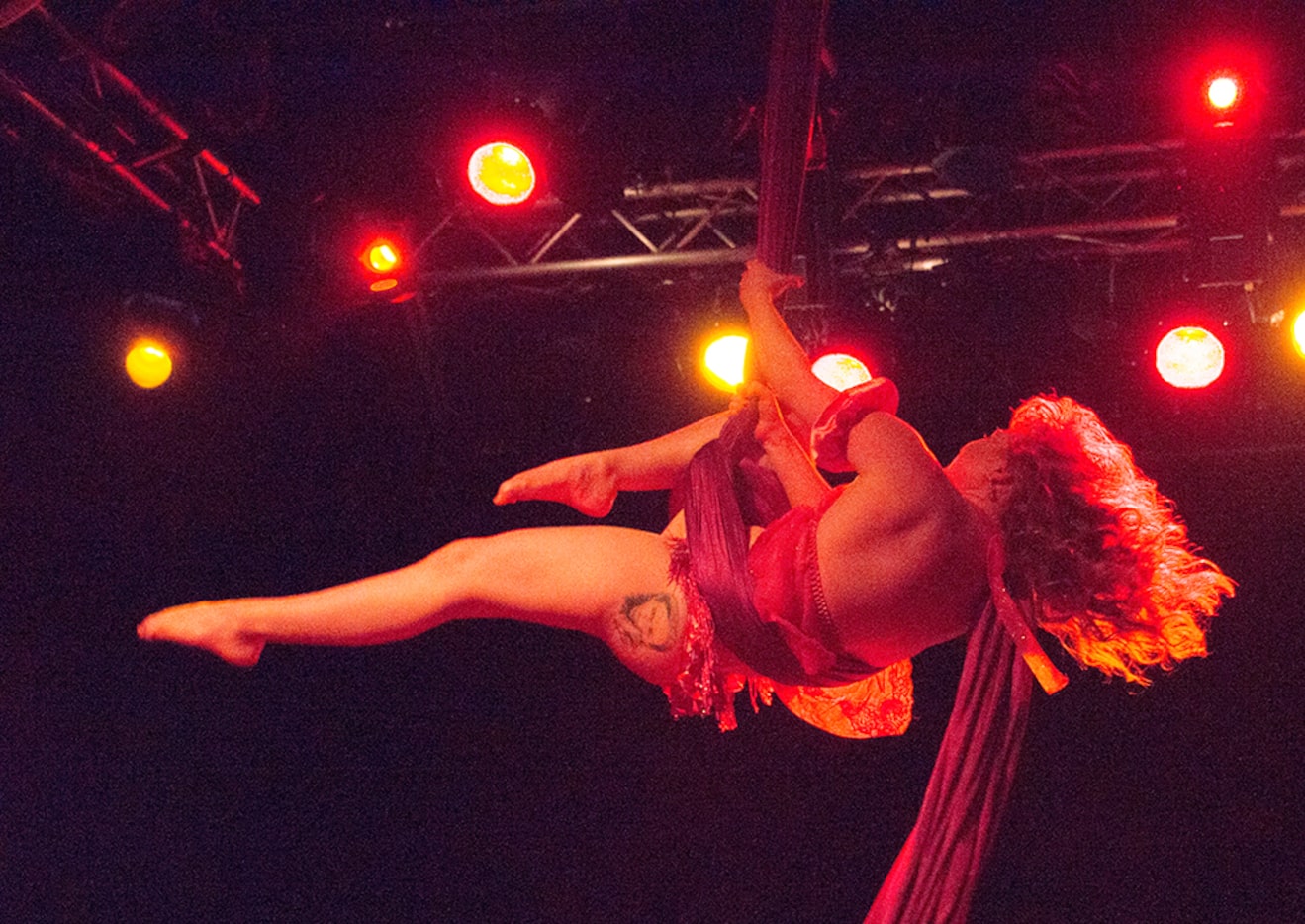 Bethany Summersizzle, who plays Clara in the ballet, swings from scarves at Trees in Deep...