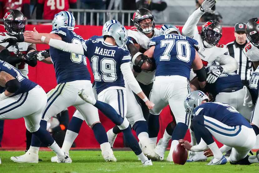 Dallas Cowboys place kicker Brett Maher (19) misses a point after try during the first half...