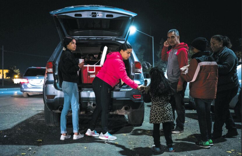 Maritza Gurrola (left), 15, and her mother Alicía Hernández, 40, both of Cuidad Juárez, hand...