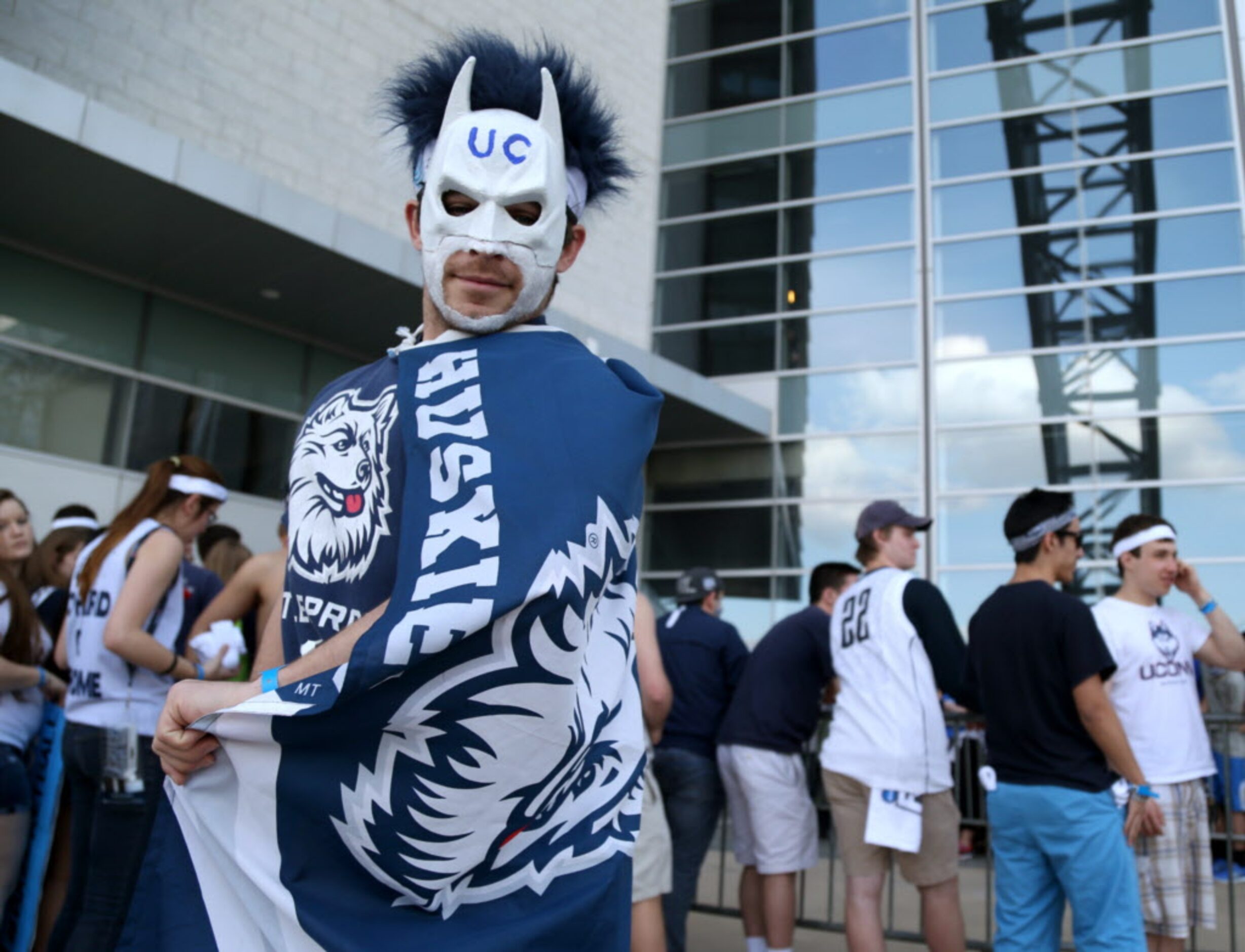 Connecticut fan Andrew Landry waits to be the first inside the stadium at the Tip-Off...