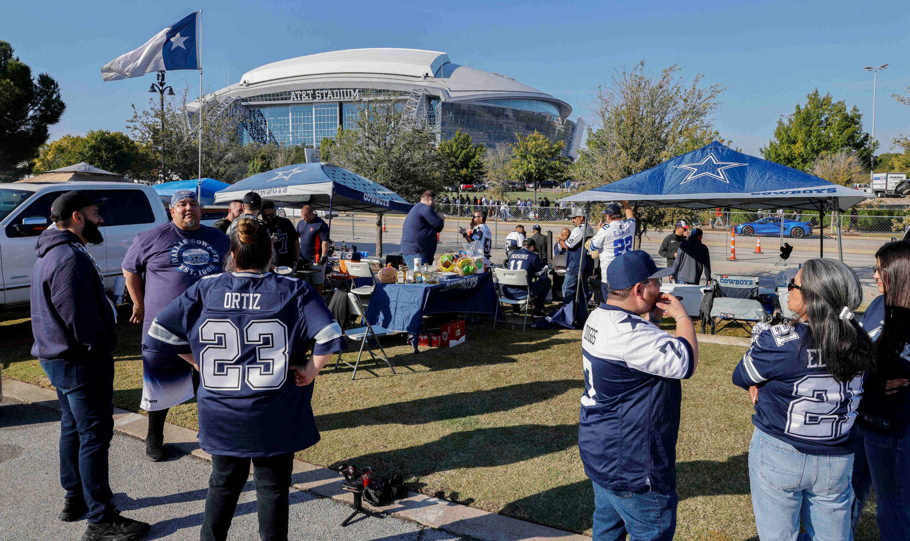 Dallas Cowboys fans tailgate before an NFL game against the Chicago Bears at AT&T Stadium in...