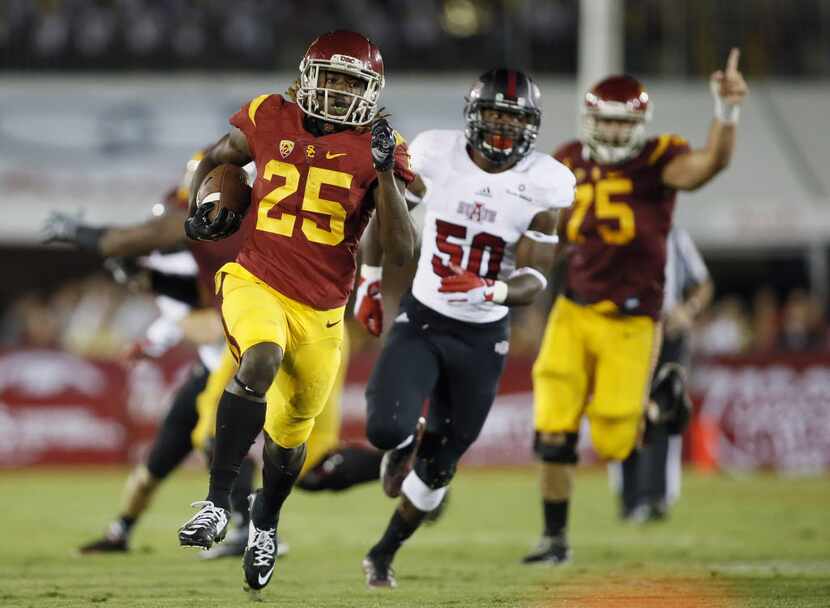 Southern California running back Ronald Jones II runs 45-yards to score a touchdown while...