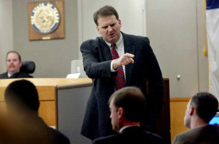Then-Dallas County prosecutor Bill Wirskye points at Randy Halprin (far right) at his June...