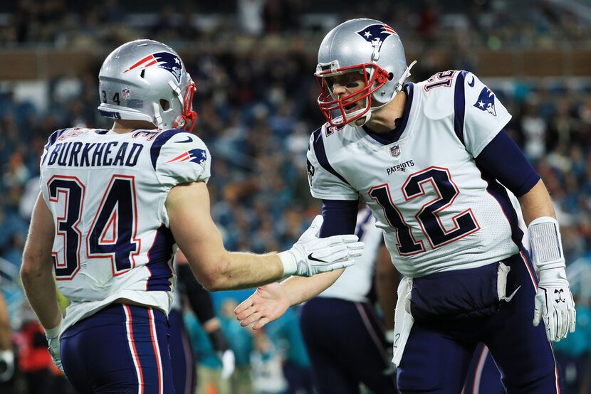 MIAMI GARDENS, FL - DECEMBER 11:  Rex Burkhead #34 celebrates his touchdown with  Tom Brady...