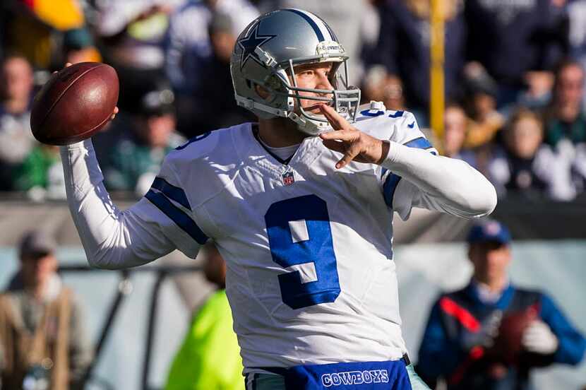 Dallas Cowboys quarterback Tony Romo (9) throws a pass during the first half of an NFL...
