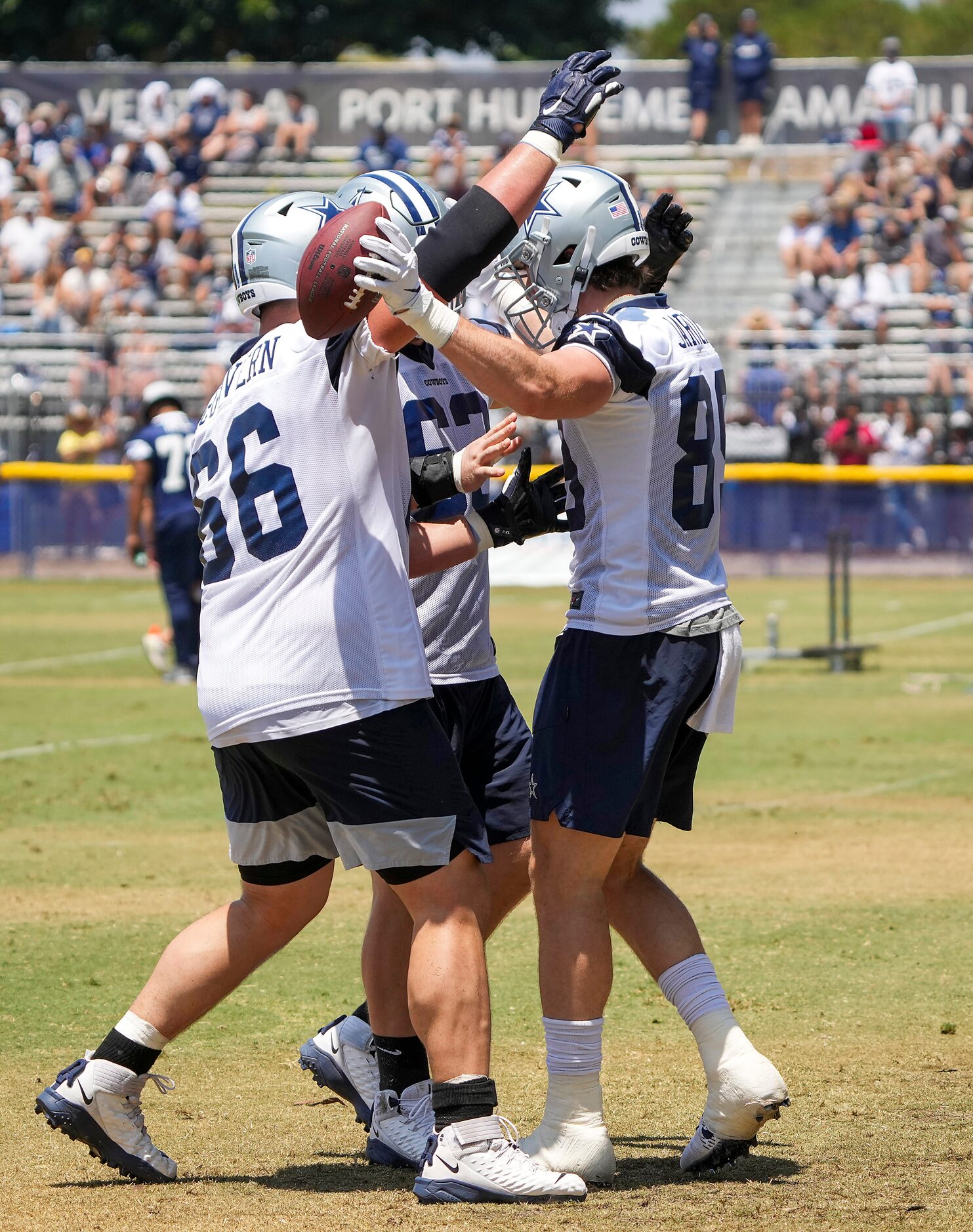 Dallas Cowboys tight end Blake Jarwin (89) celebrates with guard Connor McGovern (66) and...