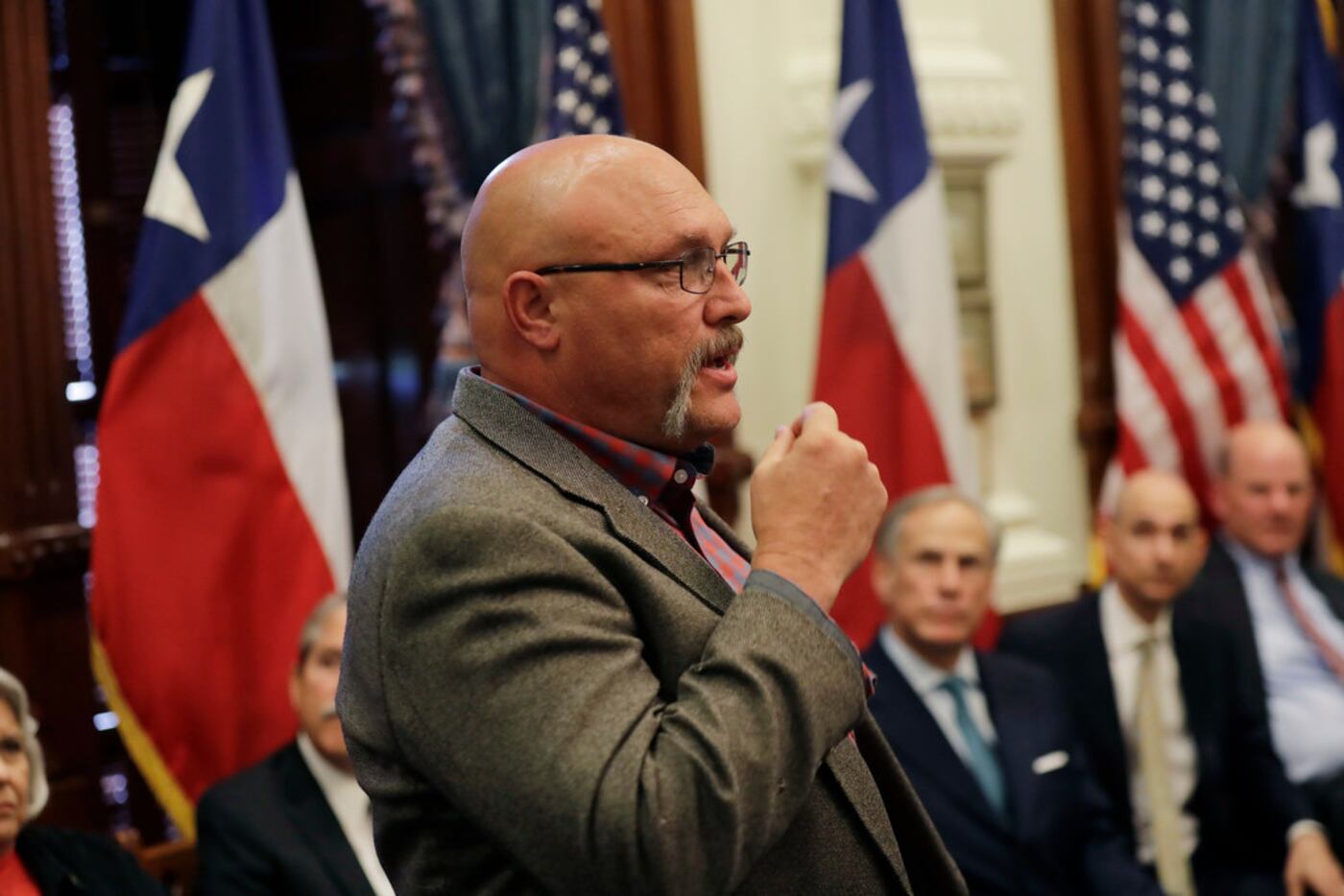 Frank Pomeroy, pastor of First Baptist Church of Sutherland Springs, standing, speaks during...