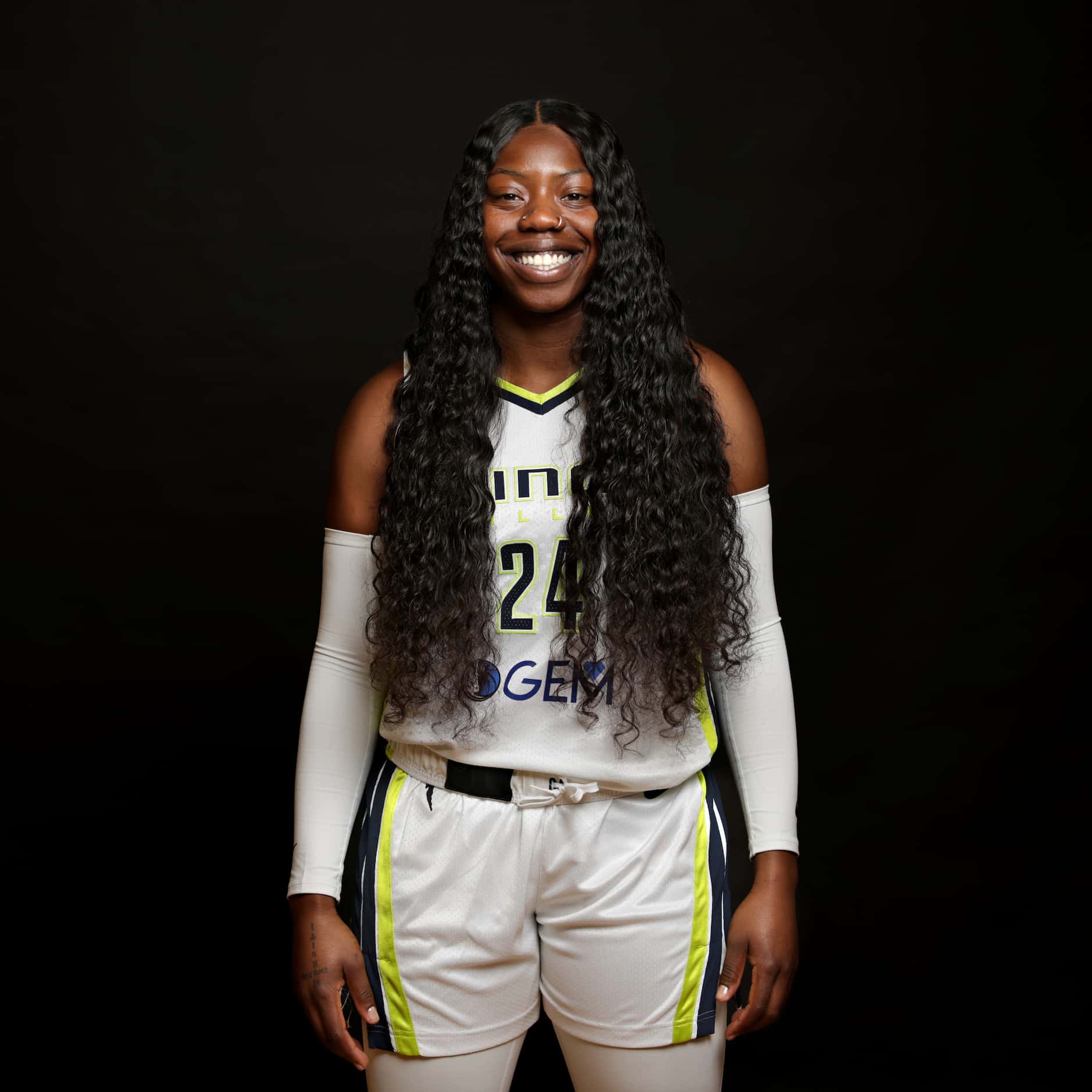 #24 Arike Ogunbowale with The Dallas Wings poses for a photograph at College Park Center in...