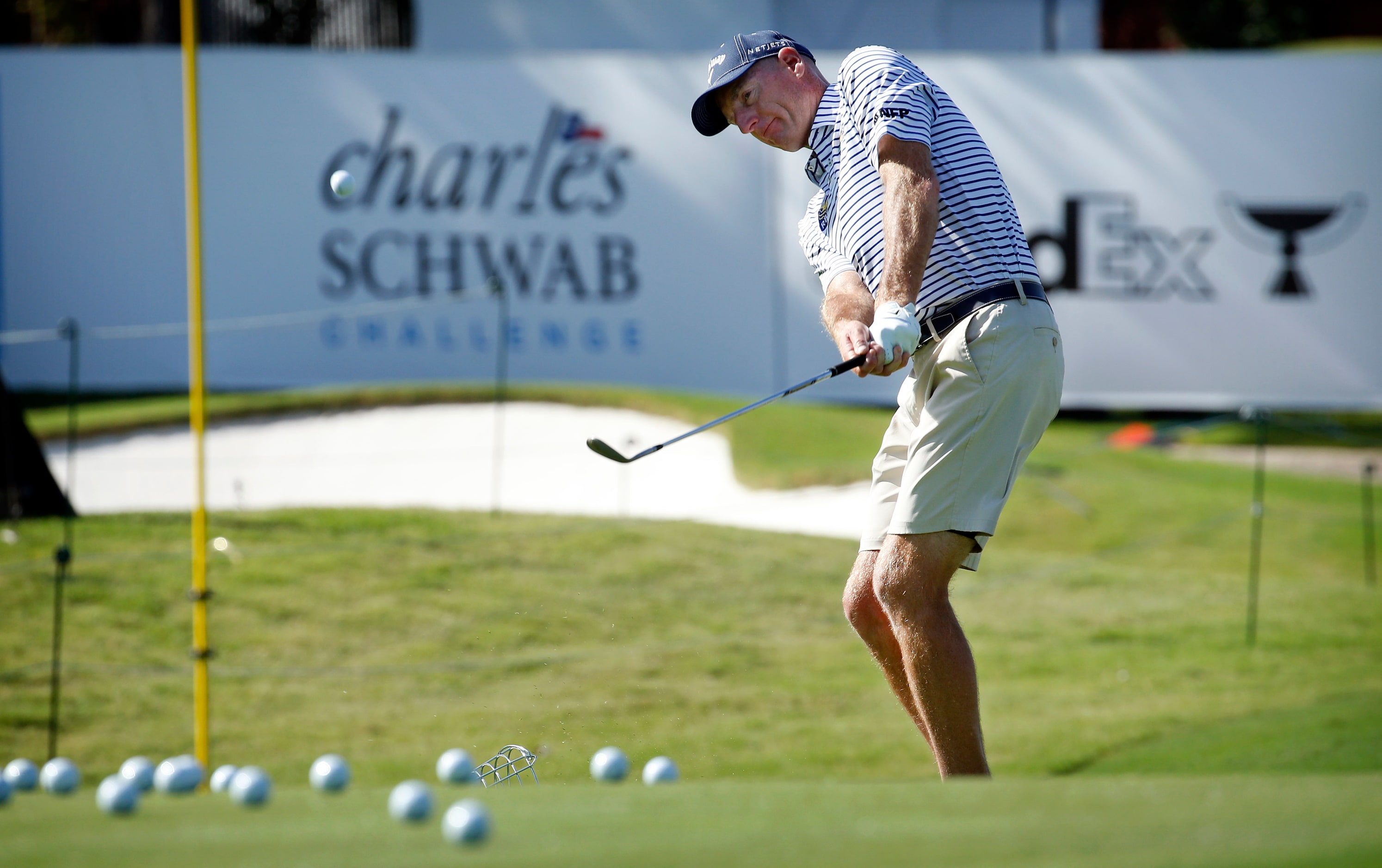 PGA golfer Tom Lehman works on his chipping in preparation for the Charles Schwab Challenge...