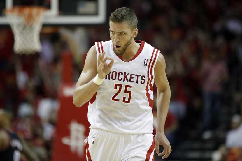 Apr 30, 2014; Houston, TX, USA; Houston Rockets forward Chandler Parsons (25) reacts to...