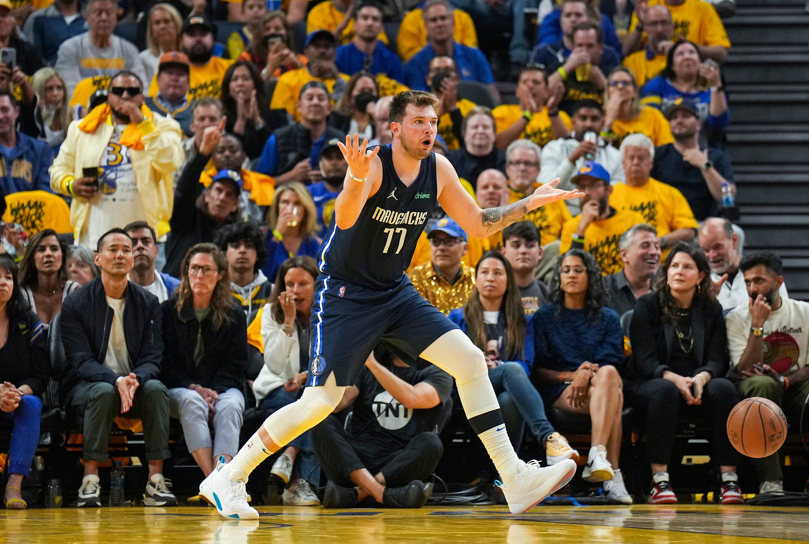 Dallas Mavericks guard Luka Doncic (77) reacts after being called for a foul during the...