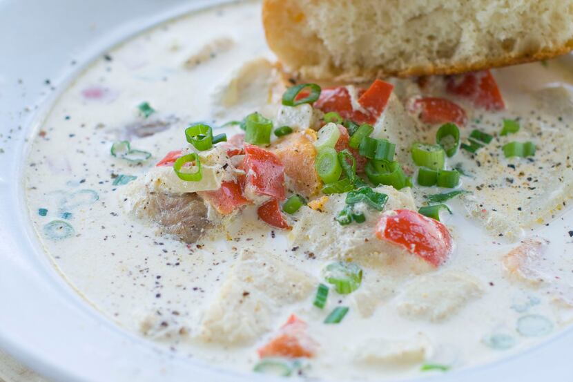 This fish chowder is prepared with sweet potatoes, white potatoes, yellow onion, and red...