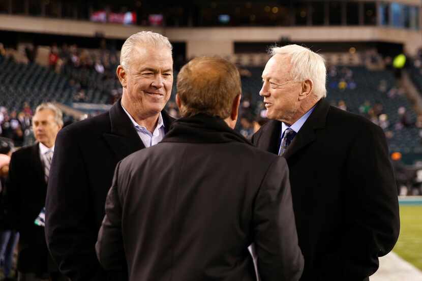 Dallas Cowboys chief operating officer Stephen Jones (left) and his father Dallas Cowboys...