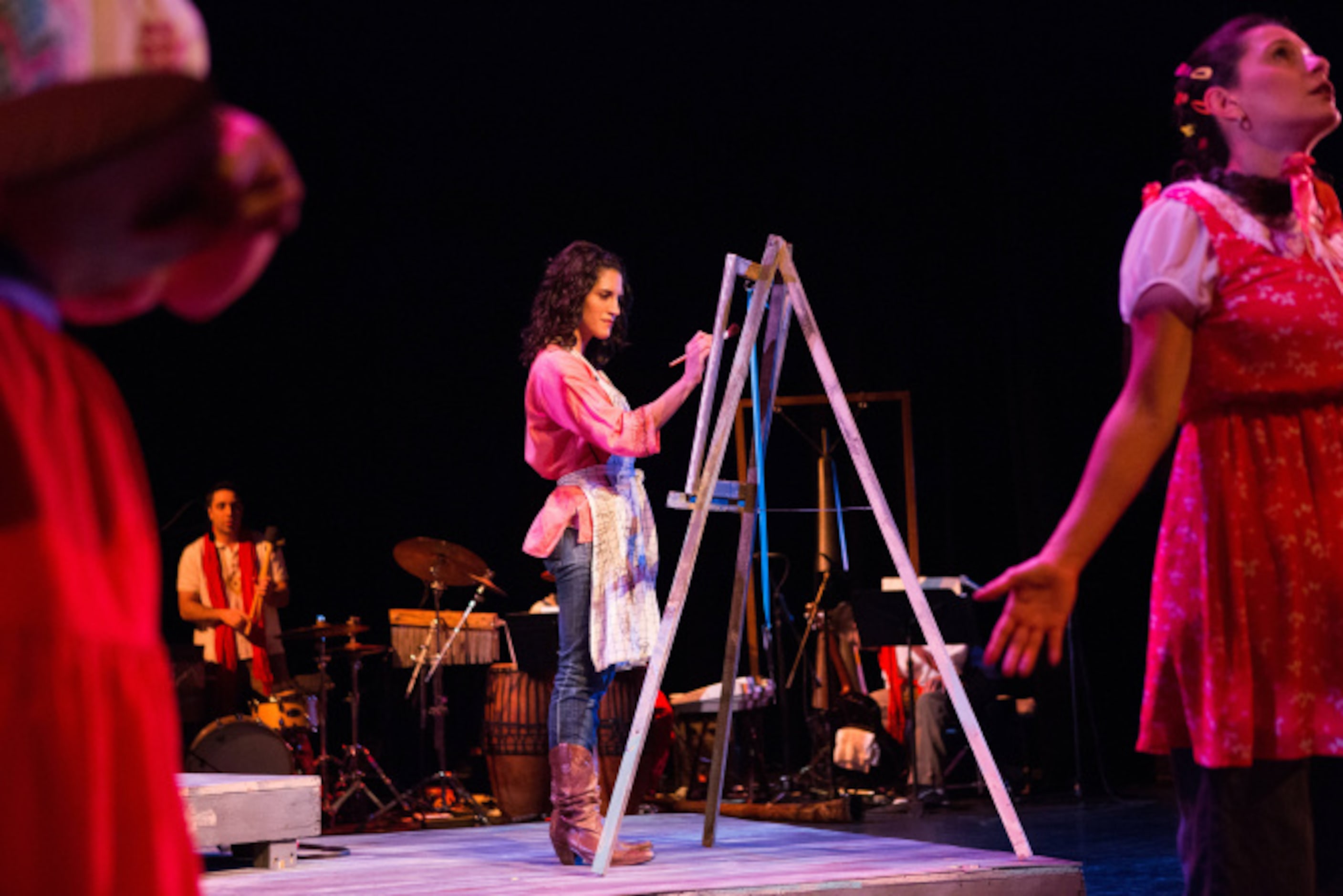 Vanessa DeSilvio, center, of the Cara Mia Theatre Company performs Milagritos at the Latino...