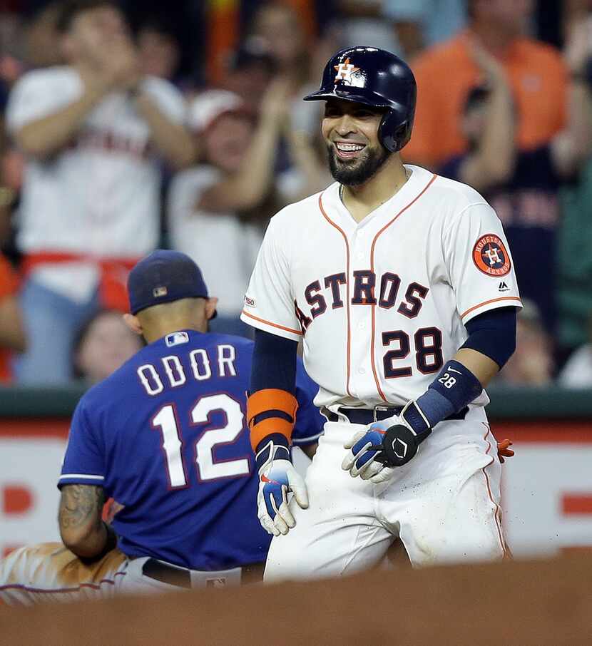 HOUSTON, TEXAS - SEPTEMBER 17: Robinson Chirinos #28 of the Houston Astros beats Rougned...