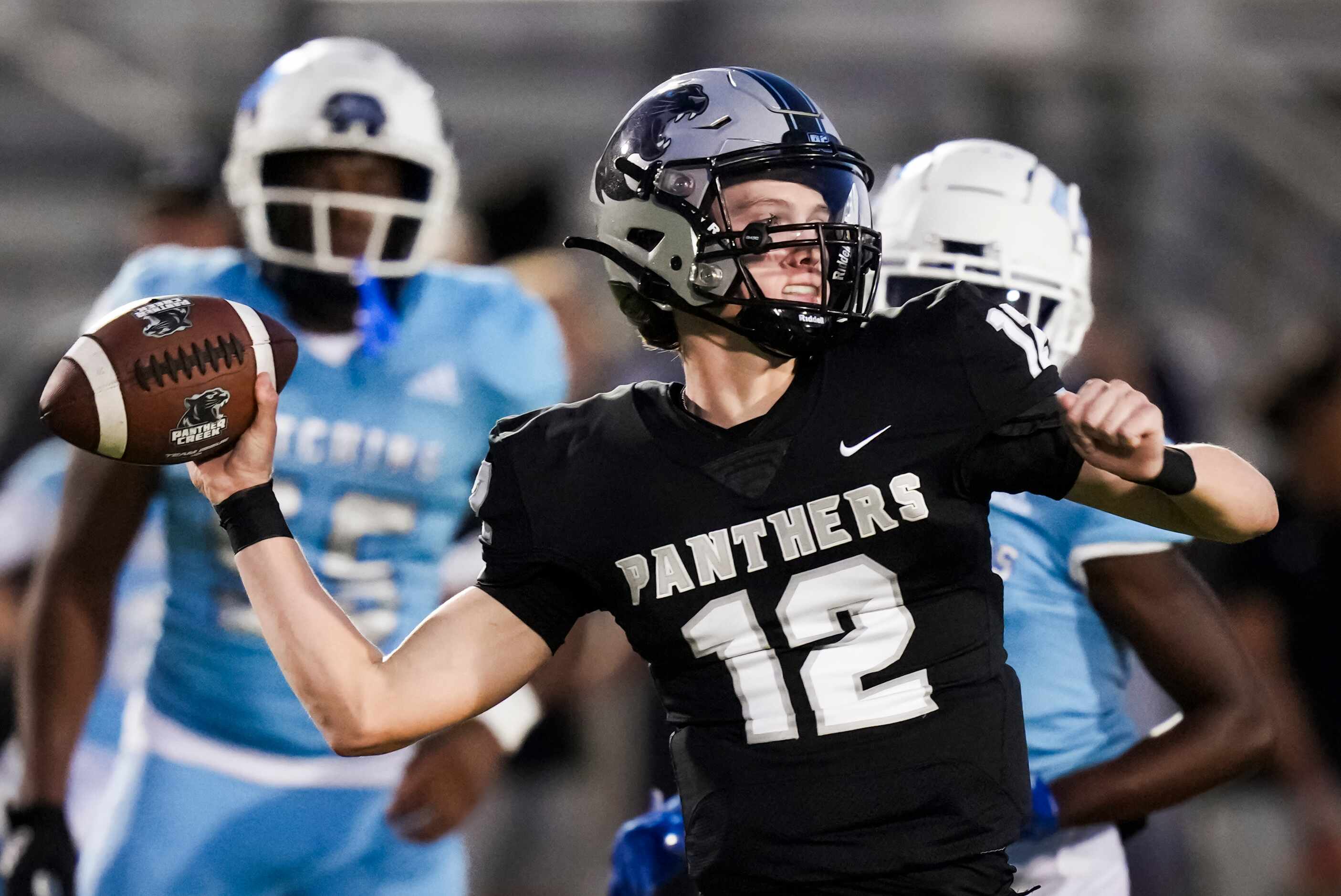 Panther Creek quarterback Braxton Roberts (12) throws a pass during the first half of a...
