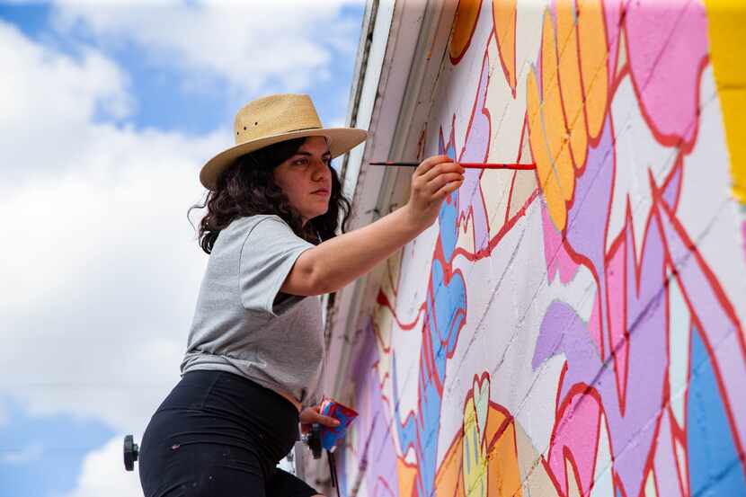 Stephanie Sanz worked on a mural with Brent Ozaeta (not pictured) as part of The Wild West...