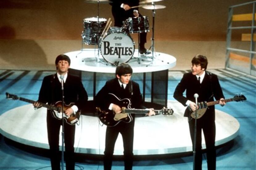 FILE - In this Feb. 9, 1964 file photo, The Beatles perform on the CBS "Ed Sullivan Show" in...