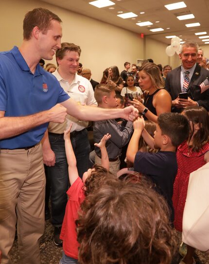 Brian Irr greets supporters during an Olympics sendoff party at The Westin Galleria in...