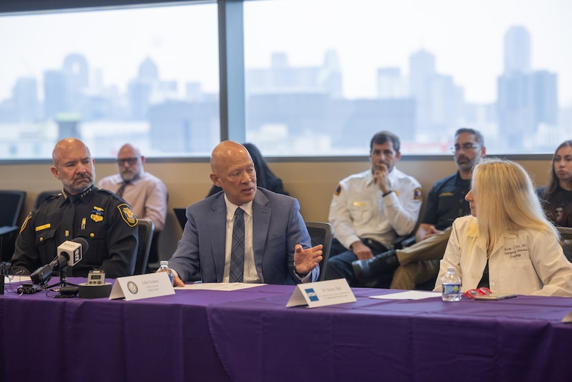 From left, Fort Worth Police Chief Neil Noakes, Dallas County District Attorney John Creuzot...