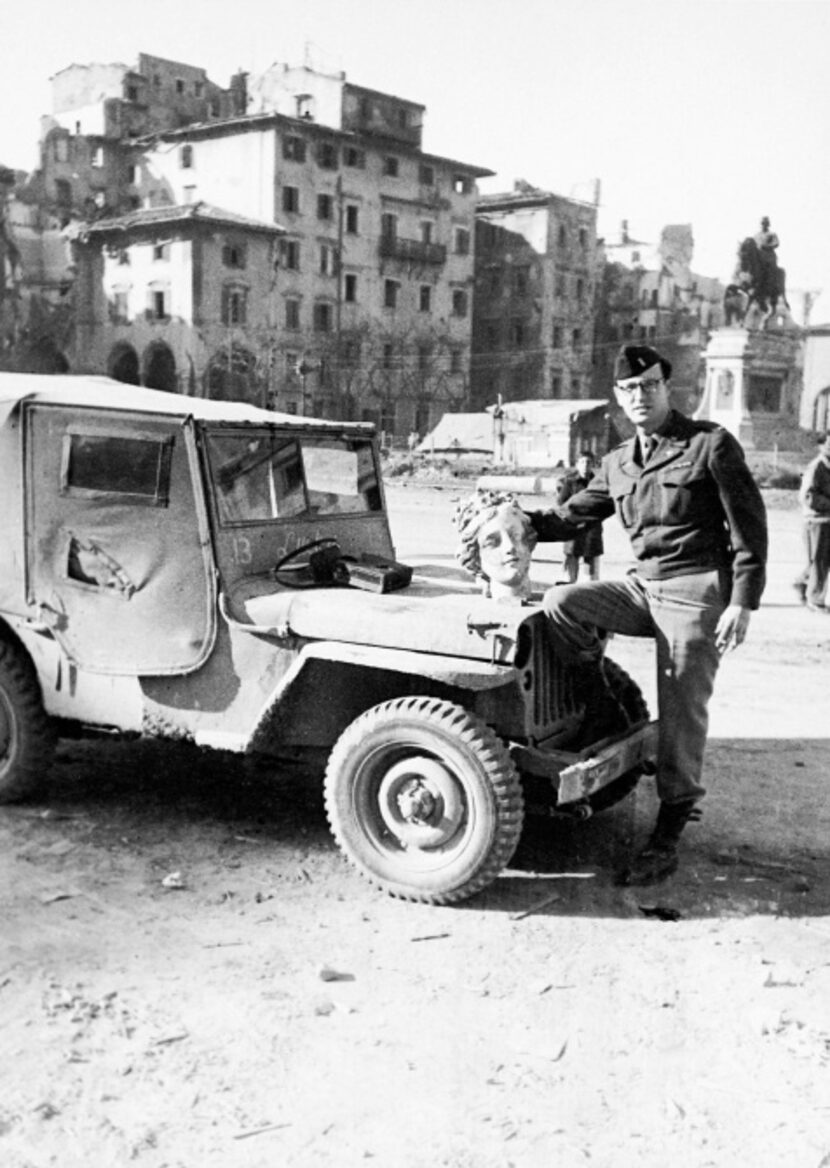  Monuments Officer Lt. Frederick  Hartt, with to his jeep, Lucky 13, was often the first to...