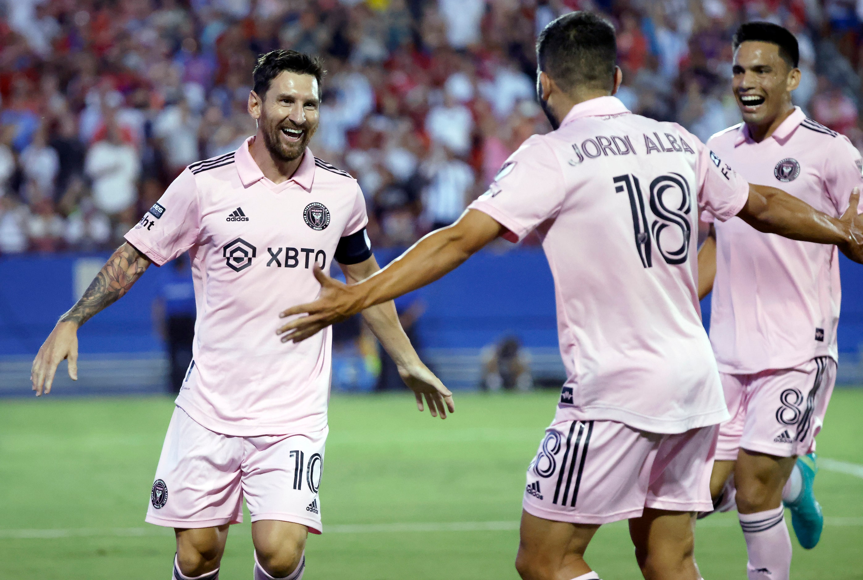 Inter Miami’s Lionel Messi (10) celebrates his first half goal with teammates in a Leagues...