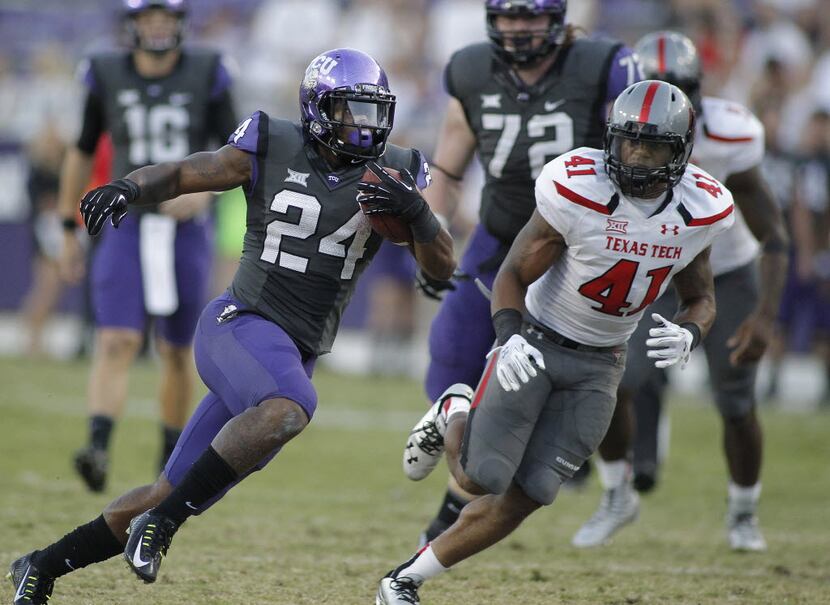 TCU Horned Frogs running back Trevorris Johnson (24) on a gain late in the fourth quarter,...