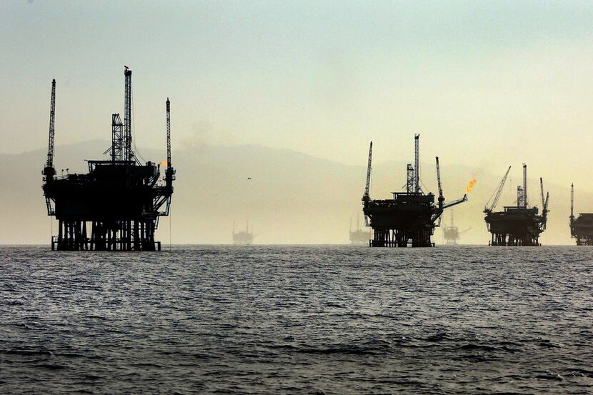 A line of off-shore oil rigs in the Santa Barbara Channel near the Federal Ecological...