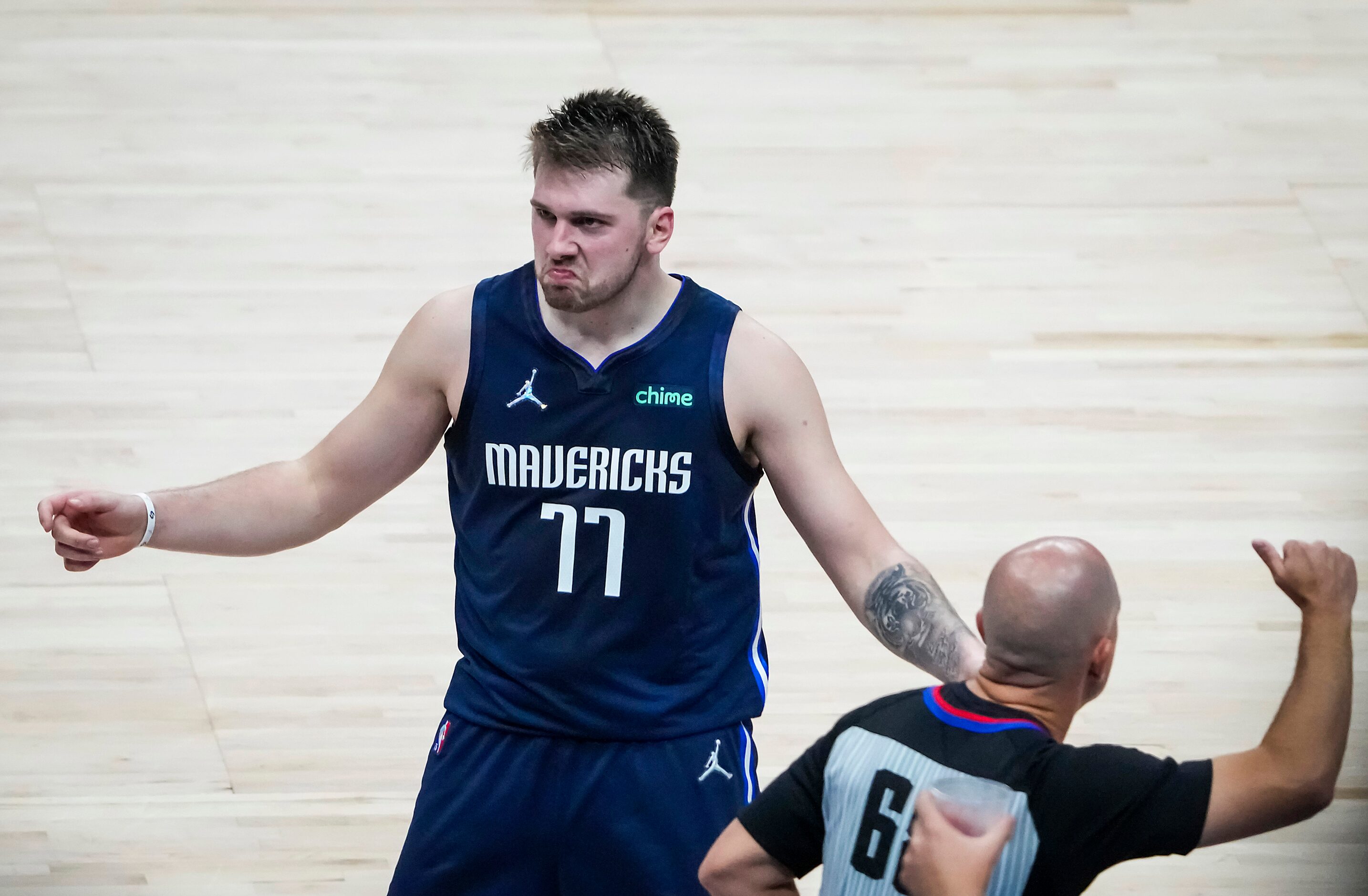 Dallas Mavericks guard Luka Doncic (77) celebrates after hitting a 3-pointer during the...