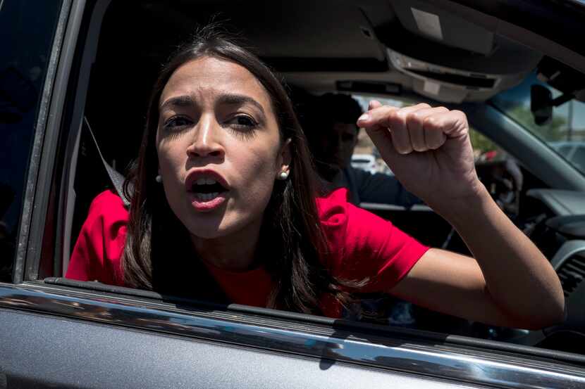 Rep. Alexandria Ocasio-Cortez, D-N.Y., speaks to reporters after visiting a Customs and...