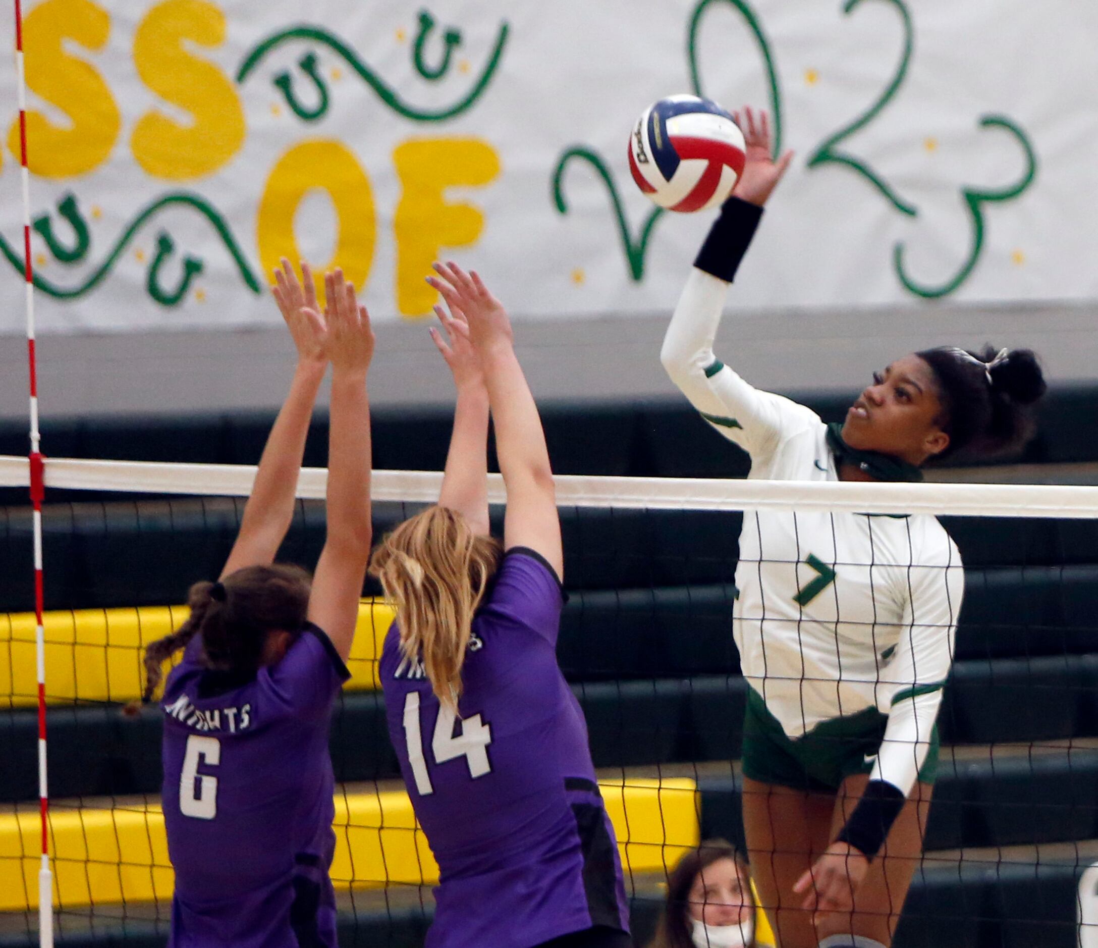 Frisco Lebanon Trail's Tyrah Ariail (7) directs a shot against the defense of Frisco...