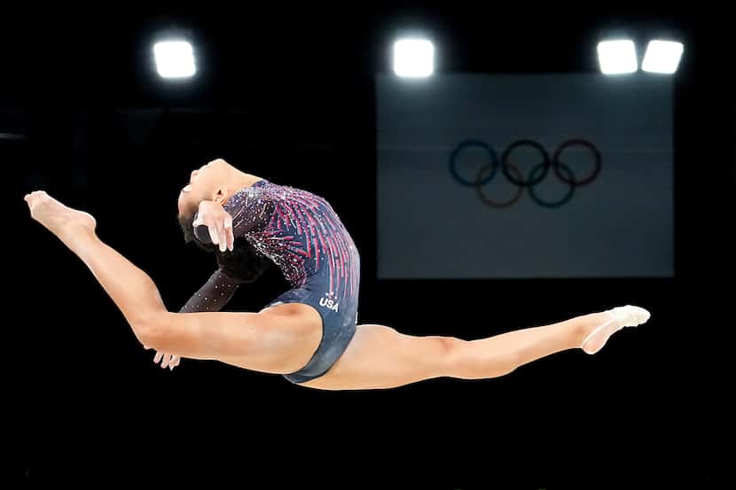 Hezly Rivera of the United States practices on the balance beam during women’s gymnastics...