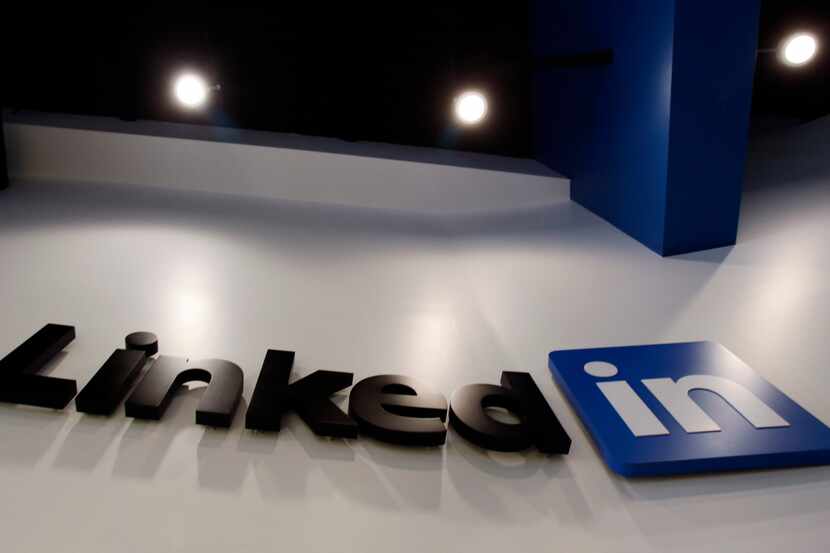 FILE - In this May 19, 2011 file photo,the LinkedIn logo is displayed in the foyer at...