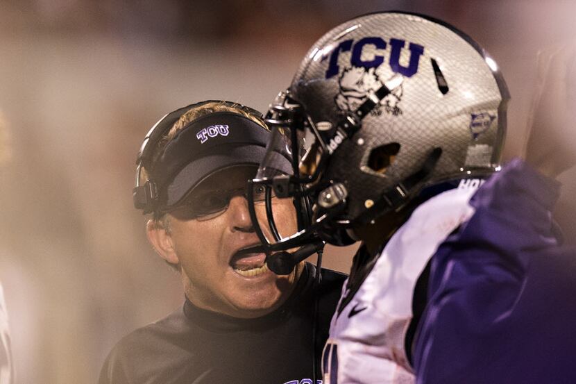 Head coach Gary Patterson of the TCU Horned Frogs yells at a player coming off the field...