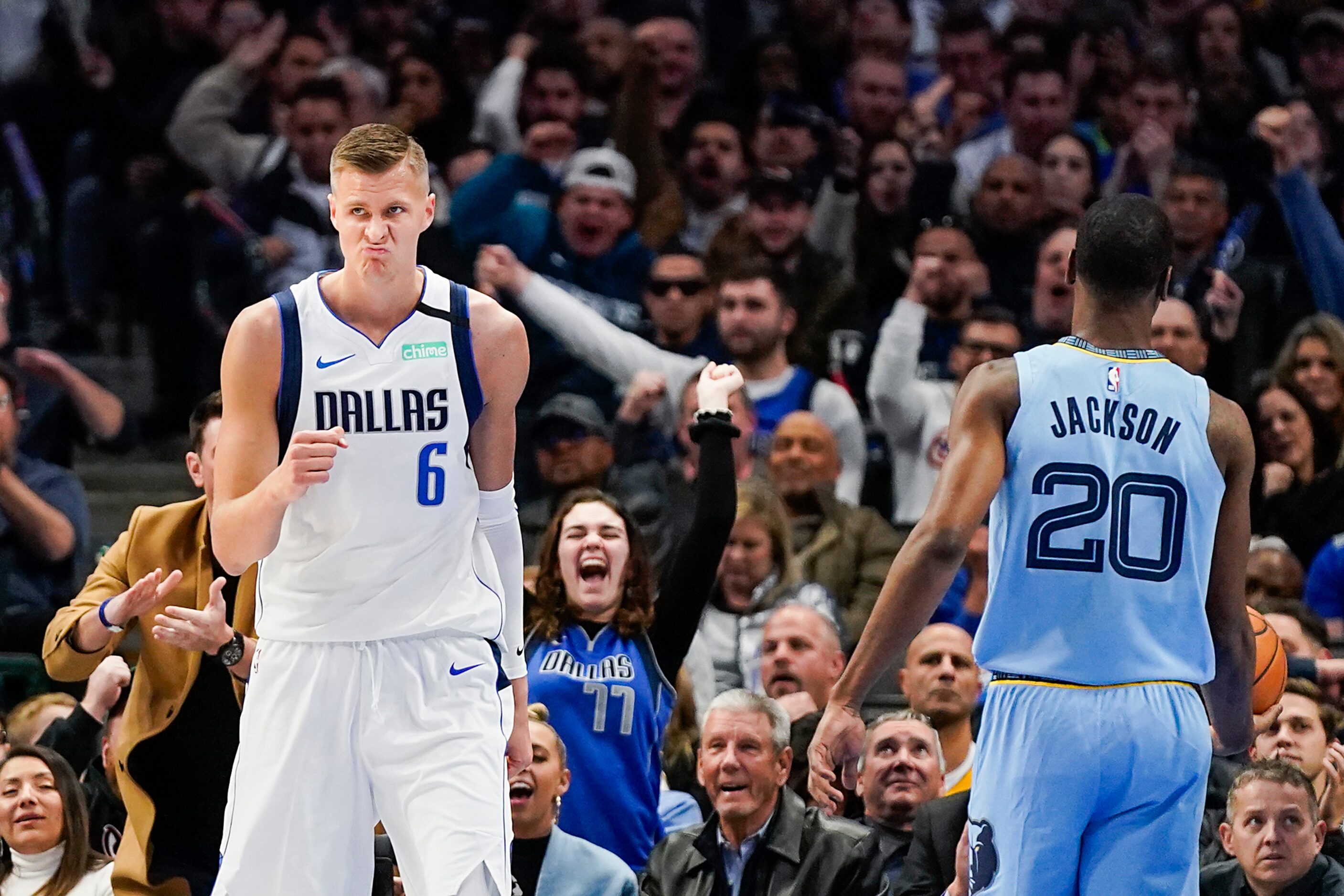 Dallas Mavericks forward Kristaps Porzingis (6) celebrates after scoring past Memphis...