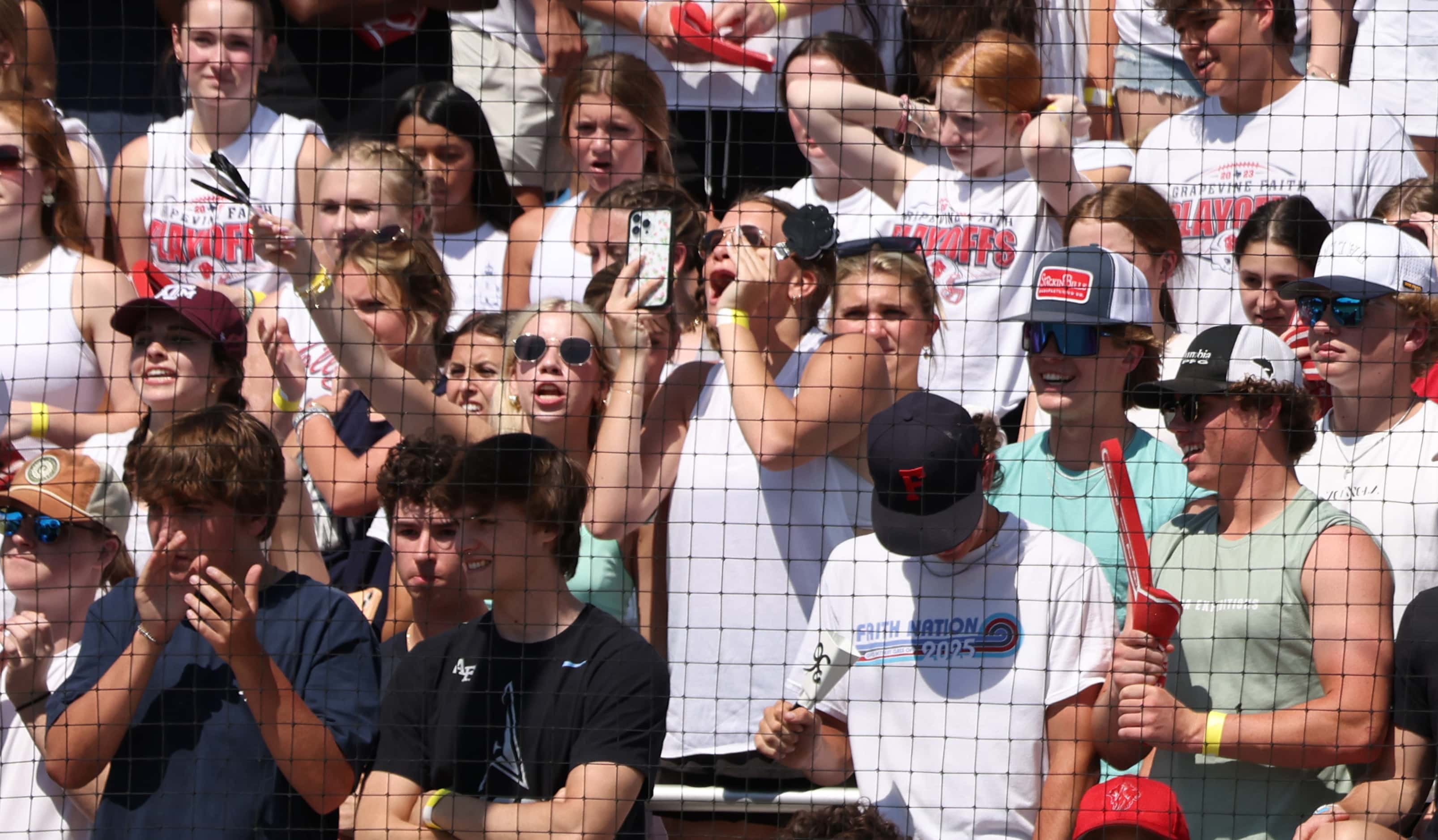 Grapevine Faith Christian fans show their support during the top of the 3rd inning of play...