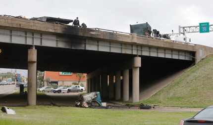 An 18-wheeler exploded and its driver died after an accident at Interstate 30 and East Grand...