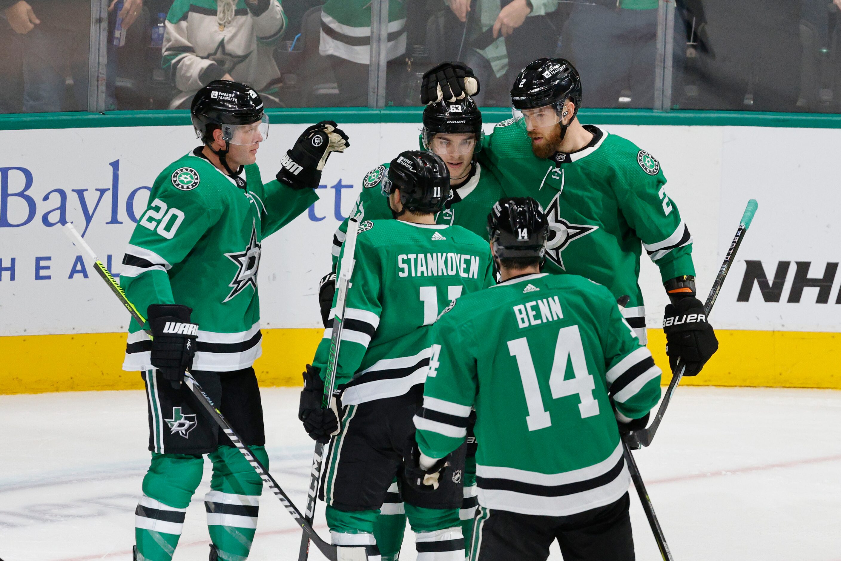 Dallas Stars center Wyatt Johnston (53) , background center, is congratulated after his goal...