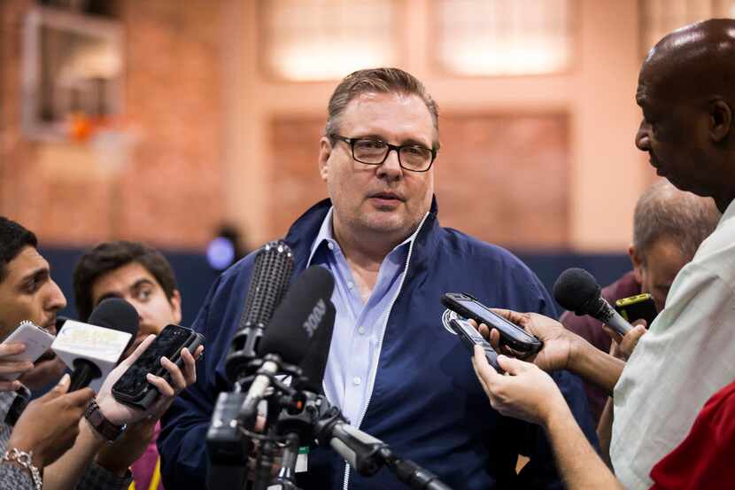 Dallas Mavericks general manager Donnie Nelson talks with reporters as the team conducts...