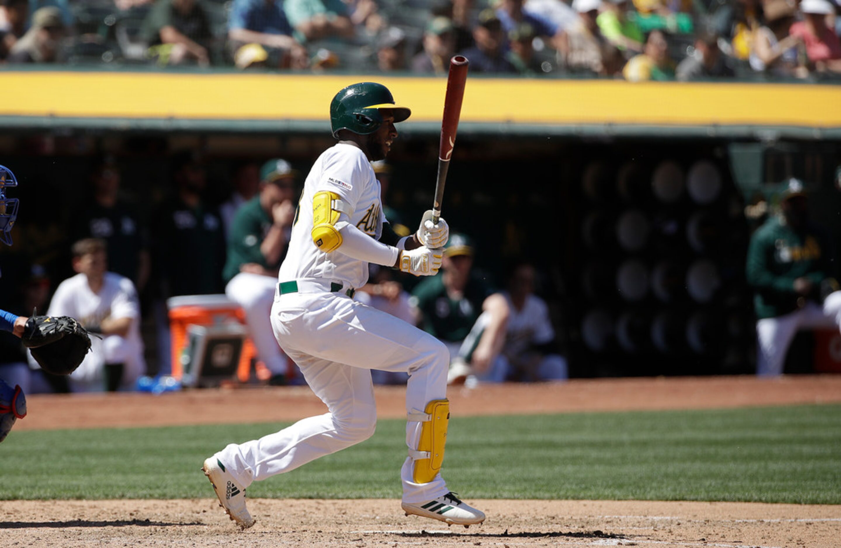 Oakland Athletics' Jurickson Profar hits an RBI-single against the Texas Rangers during the...