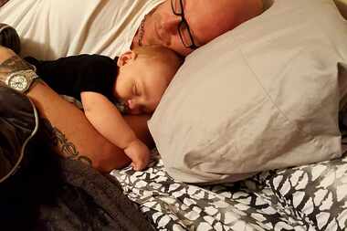 Shane Douglas Semsroth sleeps with his infant son Rayder. Semsroth was fatally shot Feb. 2...