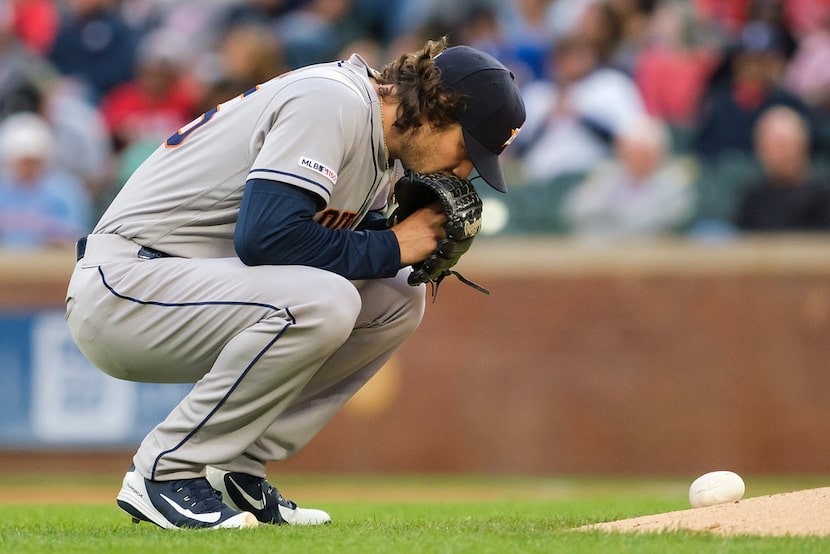 Houston Astros starting pitcher Gerrit Cole composes himself before pitching during the...